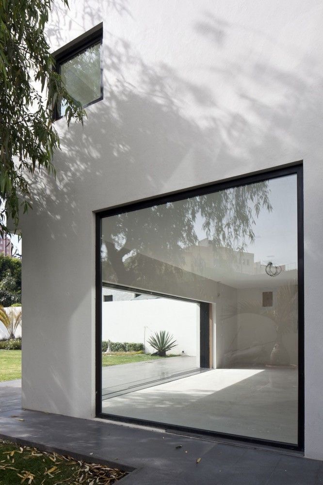 Modern exterior with oversized glass window